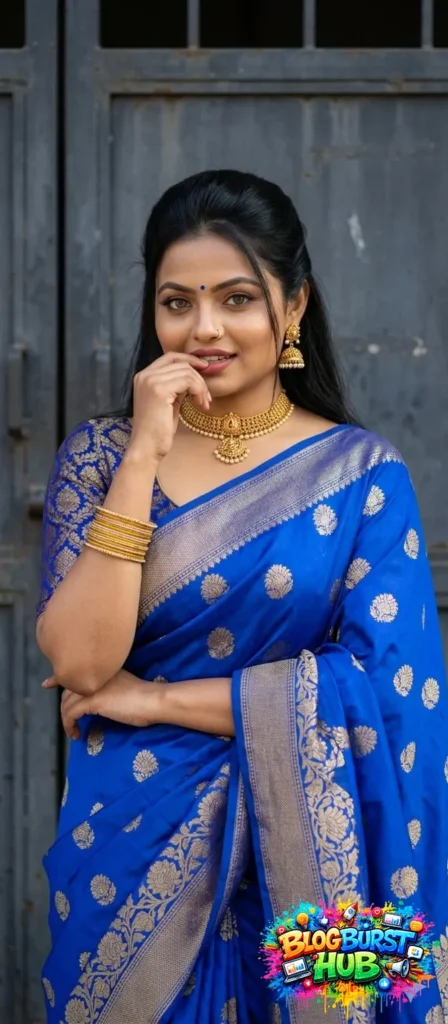 Woman wearing blue silk saree with gold jewelry traditional saree photoshoot